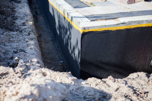 Professional Interior Drainage System technician working in Sawyer, KS
